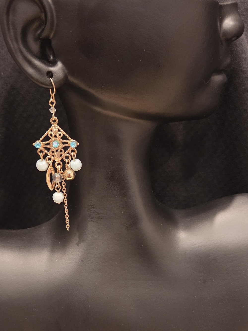 Gold Tone Dangle Earrings with Blue Accents